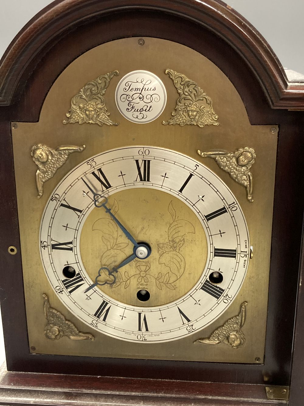 An Elliott mahogany chiming bracket clock, with traditional 14cm dial